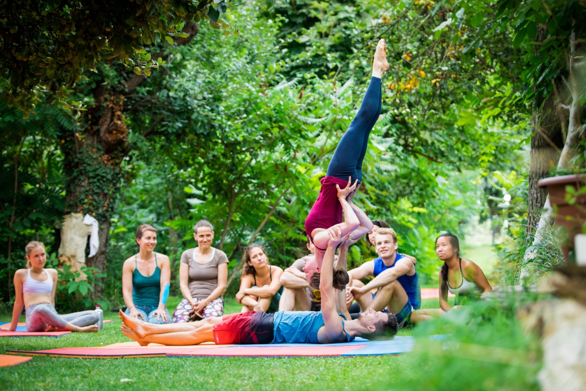 Foto of me teaching AcroYoga.